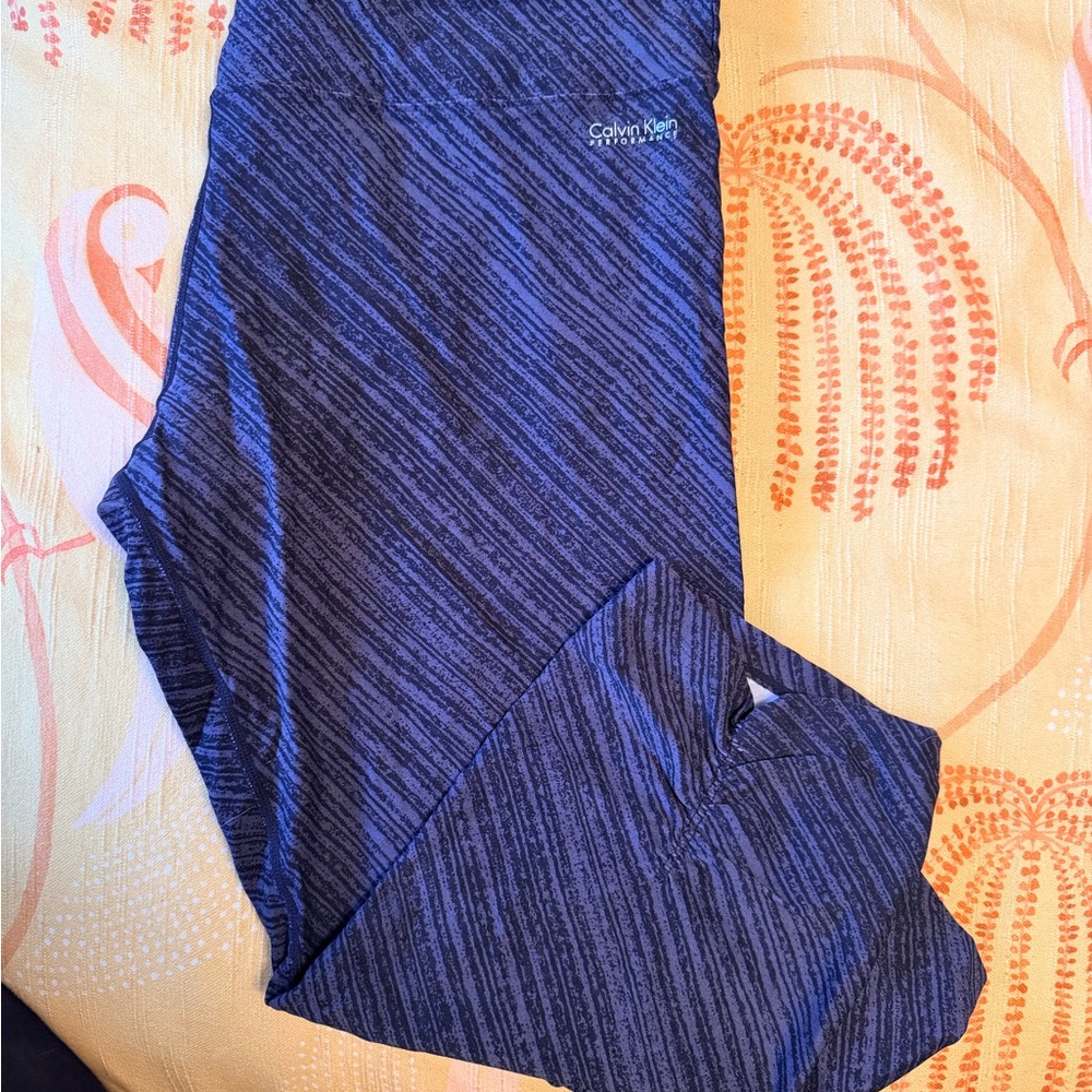 Calvin Klein Performance Quick Dry Capri Leggings in Black & Grey.